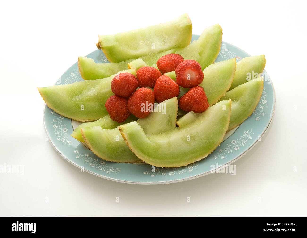 Acqua mellon e fragole su un piatto di portata Foto Stock