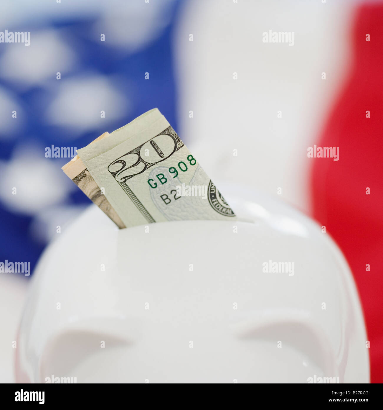 Venti dollari nel salvadanaio asola Foto Stock