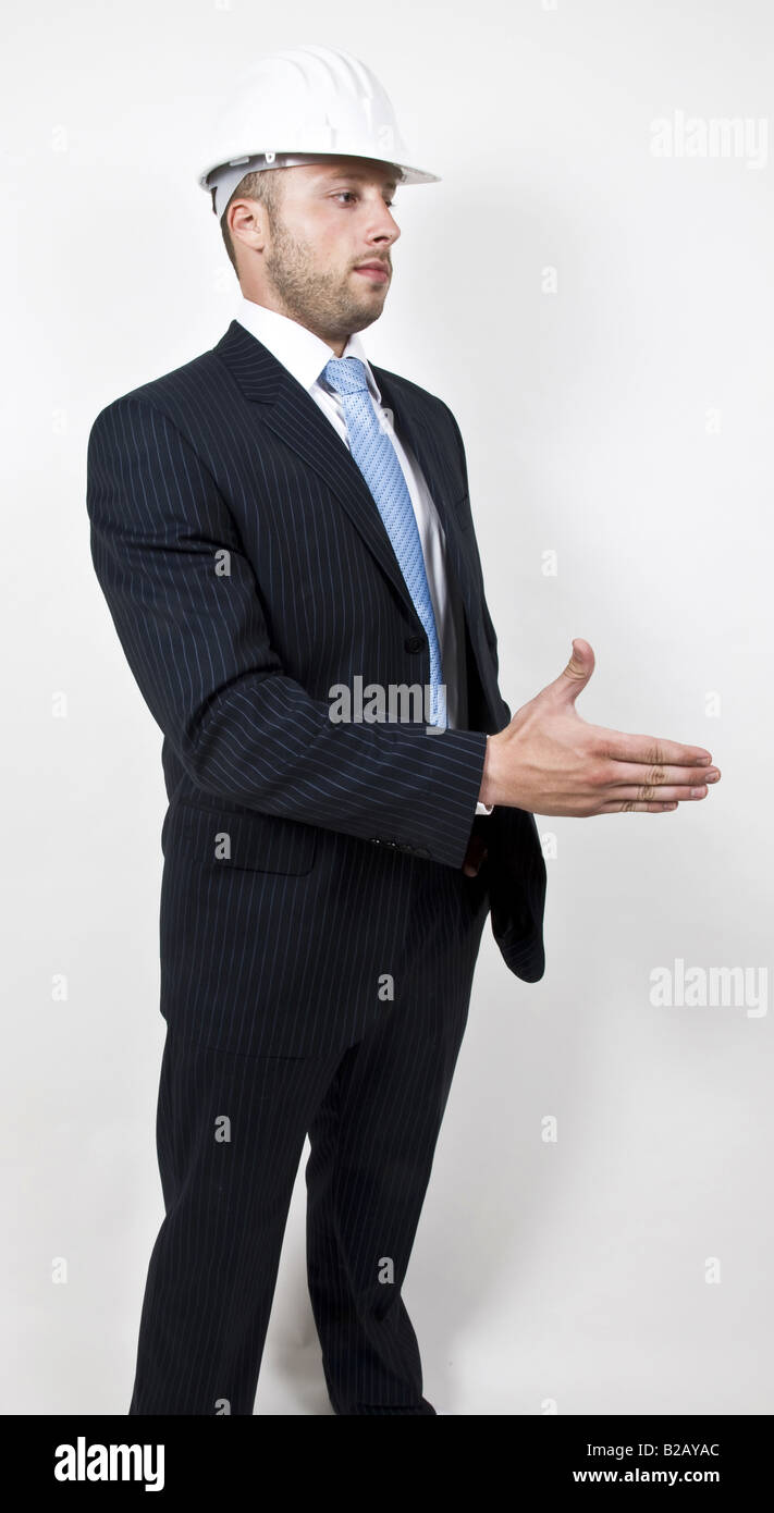 Architetto nella posa di agitare a mano Foto Stock