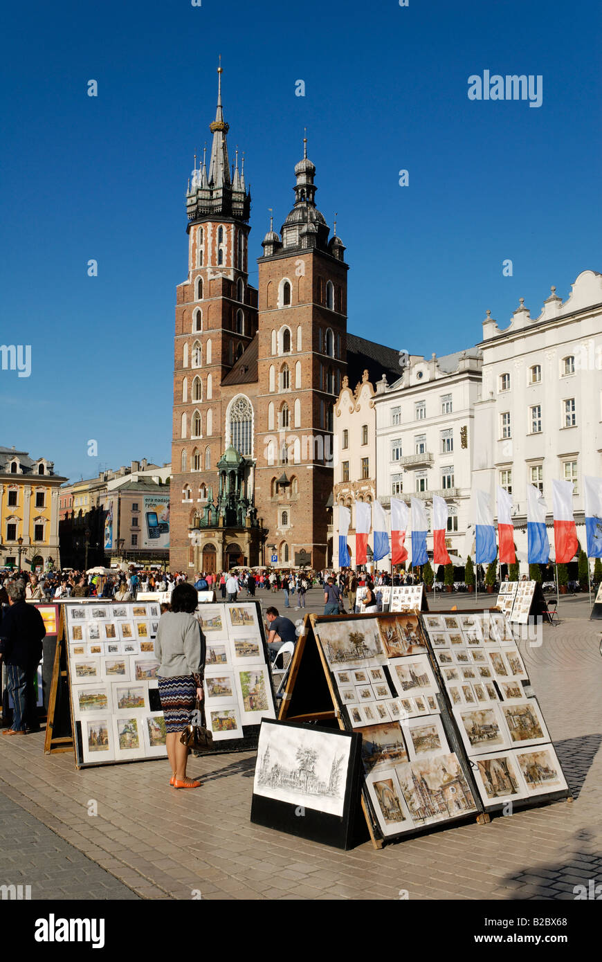 Il mercato dell'arte sulla Piazza del Mercato di Cracovia, Rynek, Sito Patrimonio Mondiale dell'UNESCO, Polonia, Europa Foto Stock