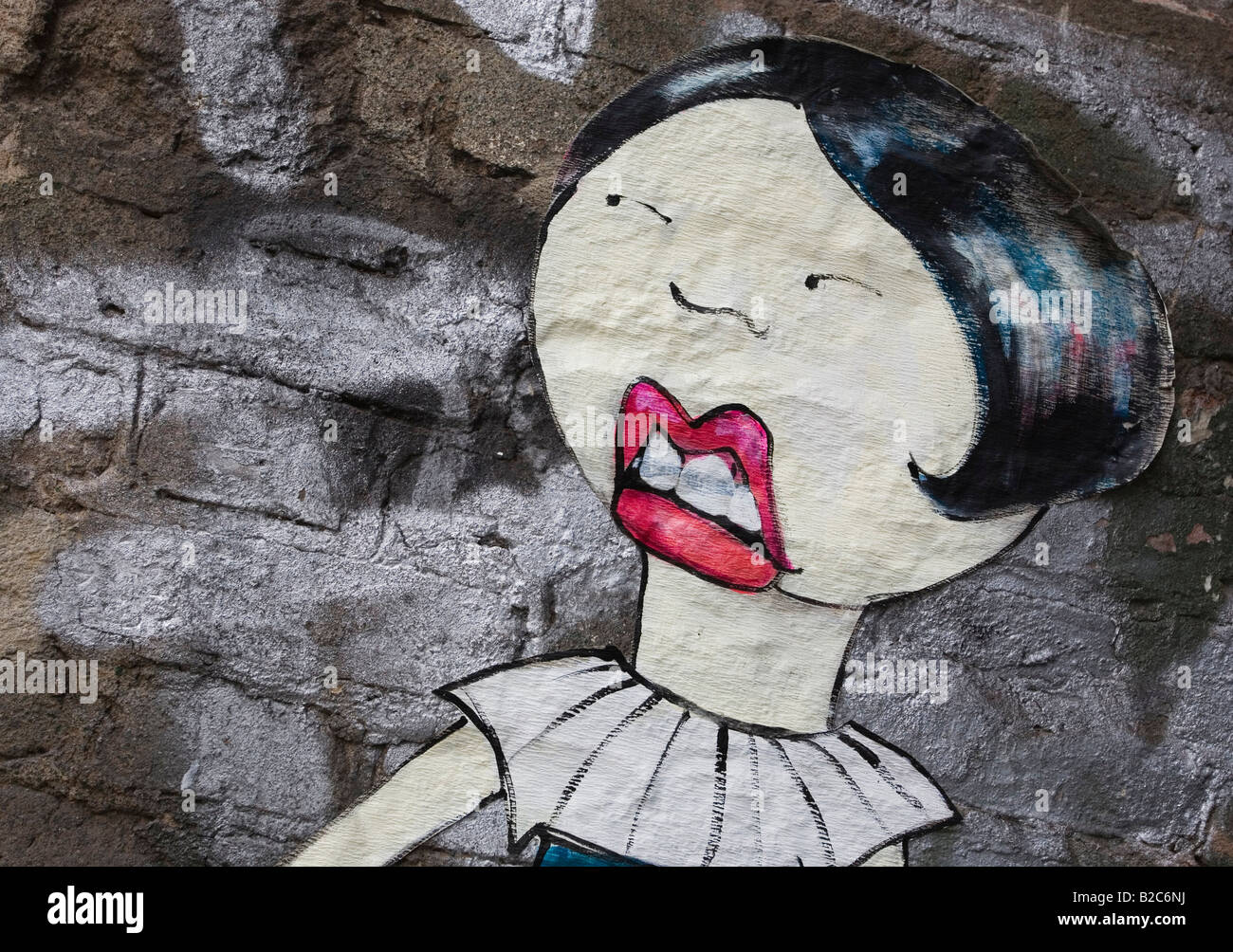 Graffiti su un muro di casa a Berlino, Germania, Europa Foto Stock