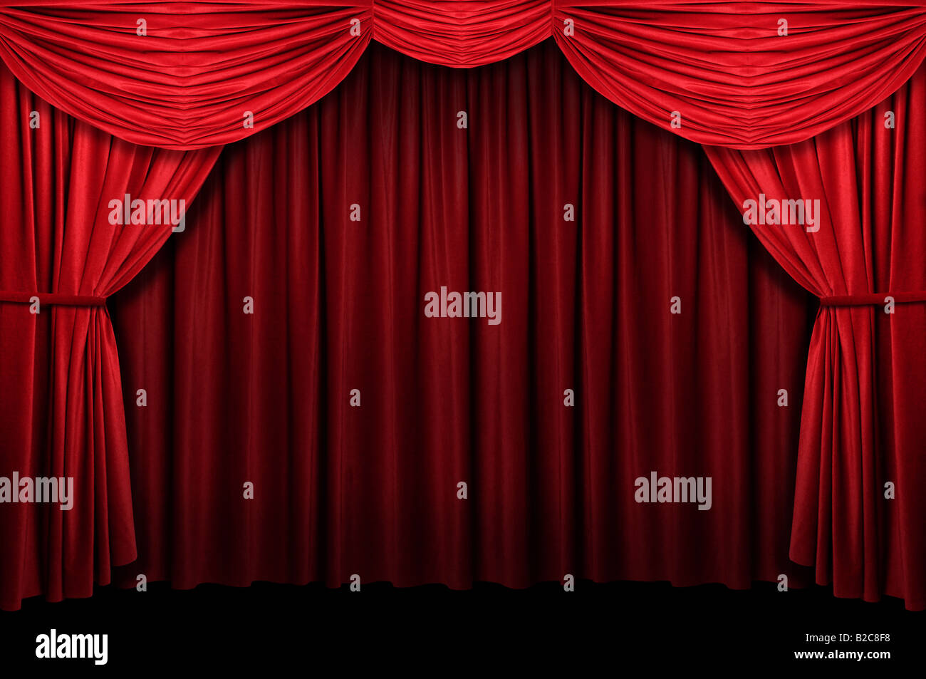 Red sipario di un palcoscenico con ingresso ad arco Foto Stock
