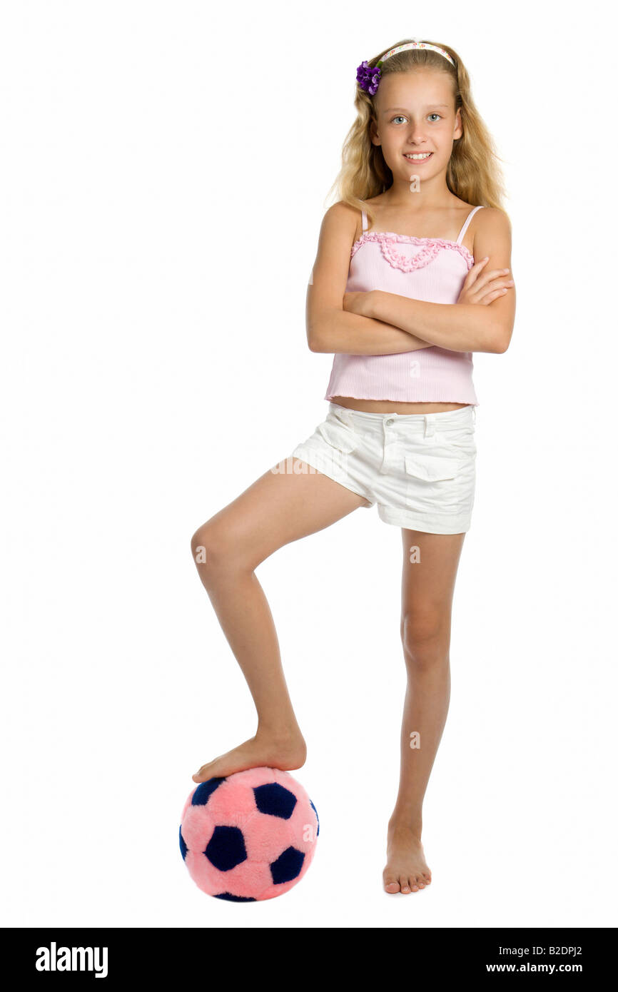 Giovane ragazza carina con pelo toy pallone da calcio Foto Stock