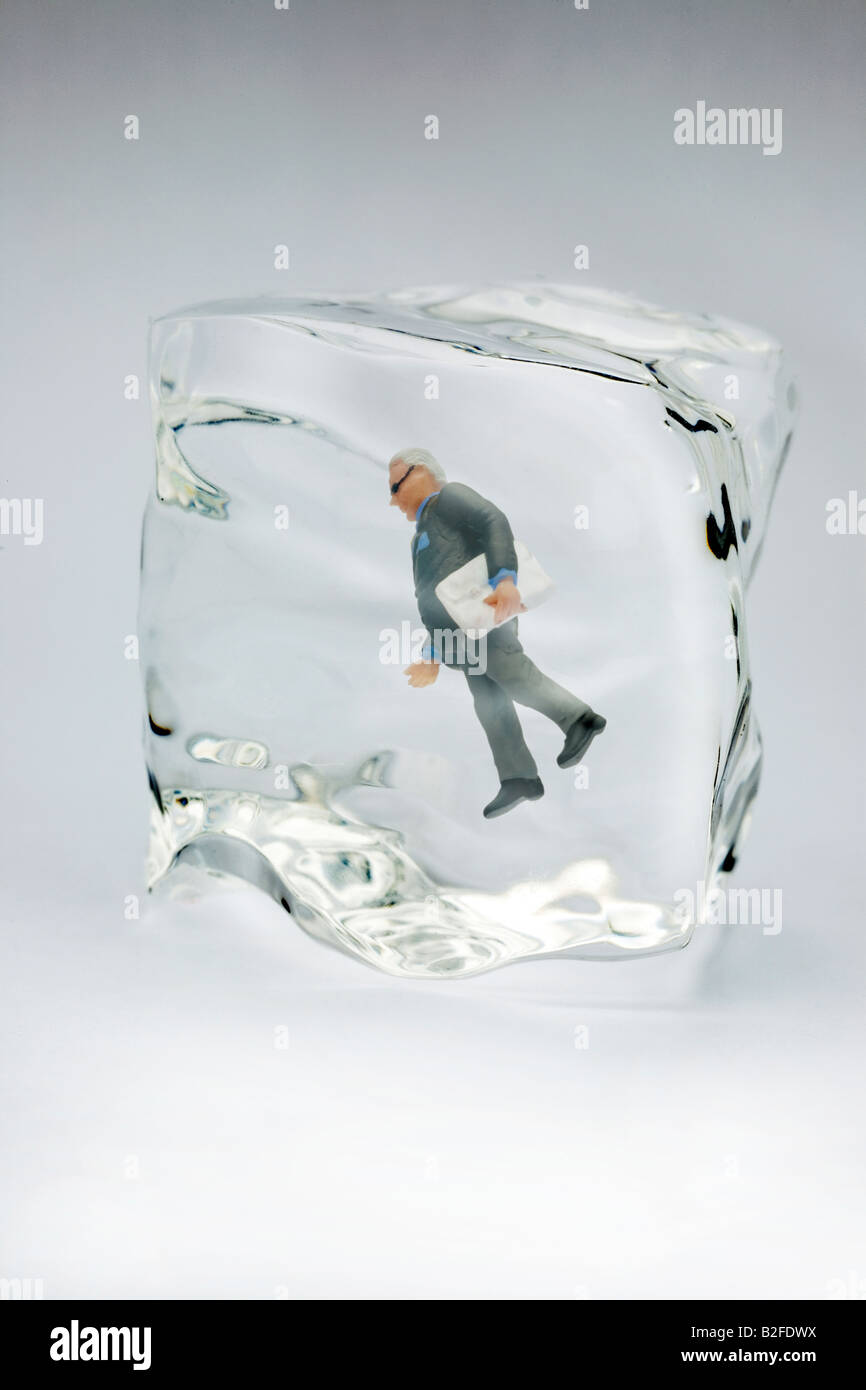 Executive in un cubetto di ghiaccio Foto Stock