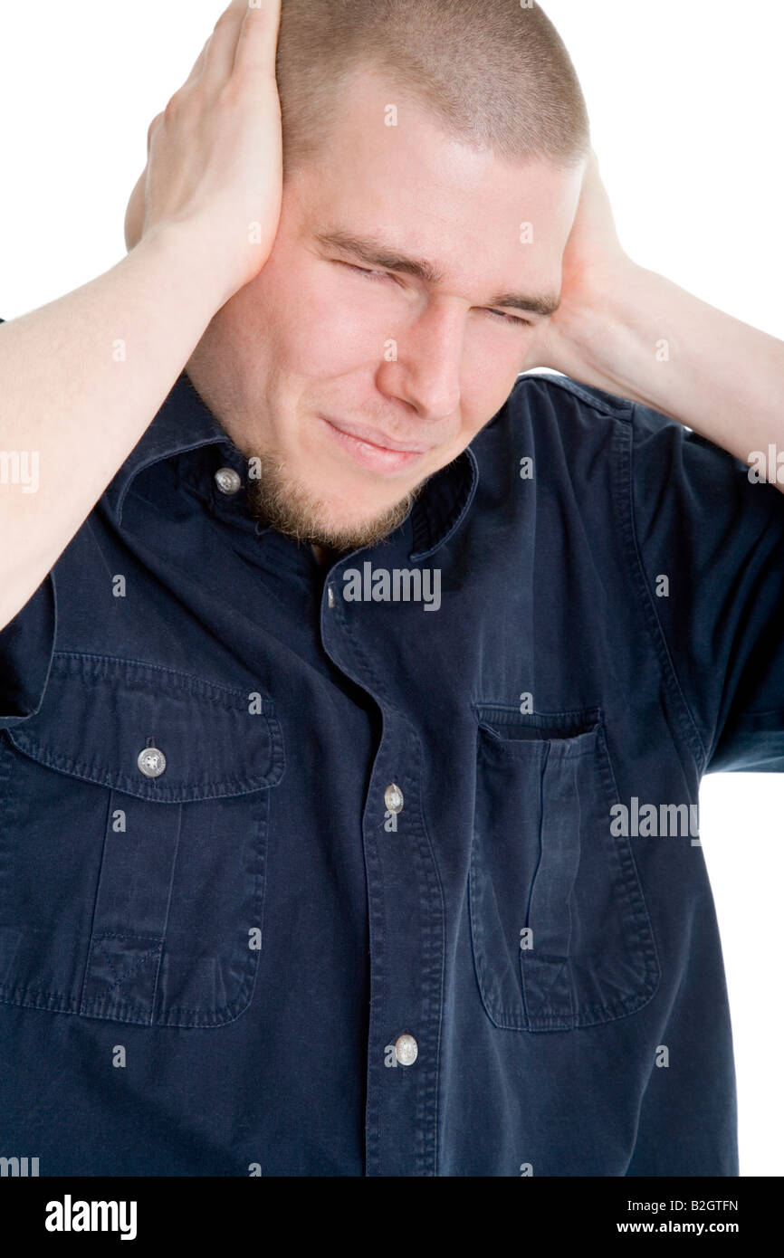 Giovane uomo ha sottolineato lo stress rumoroso nois mal di testa il mal di testa di persone Foto Stock