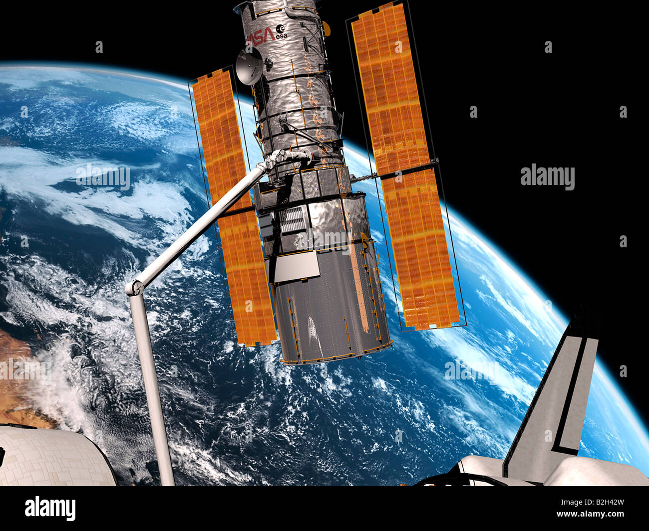 La NASA Telescopio Spaziale Hubble agganciato alla navetta per la riparazione Foto Stock