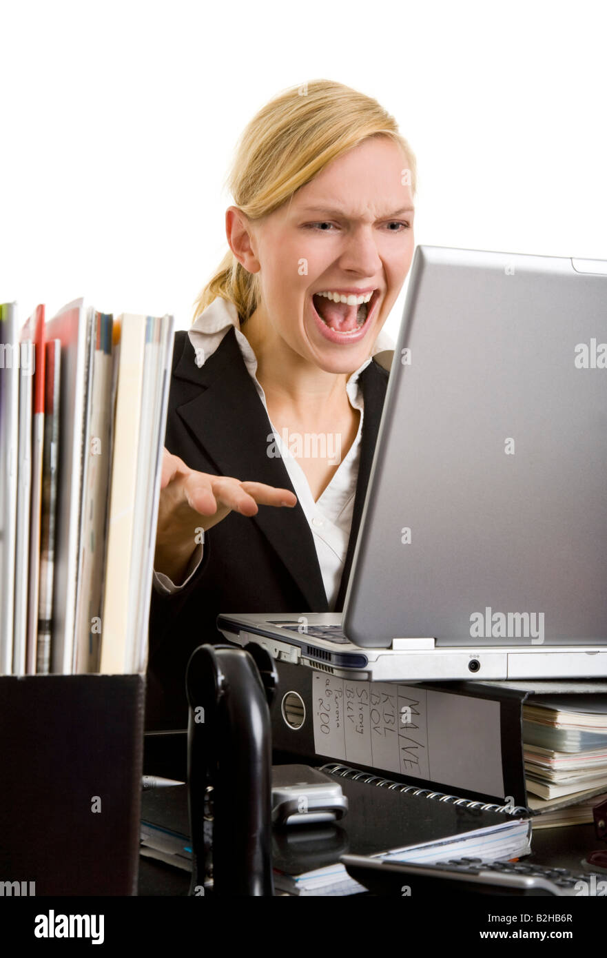 Assistente ufficio segreteria lavoro lavoro impiegatizio laptop notebook pc  computer ha sottolineato arrabbiato donna sul posto di lavoro Foto stock -  Alamy