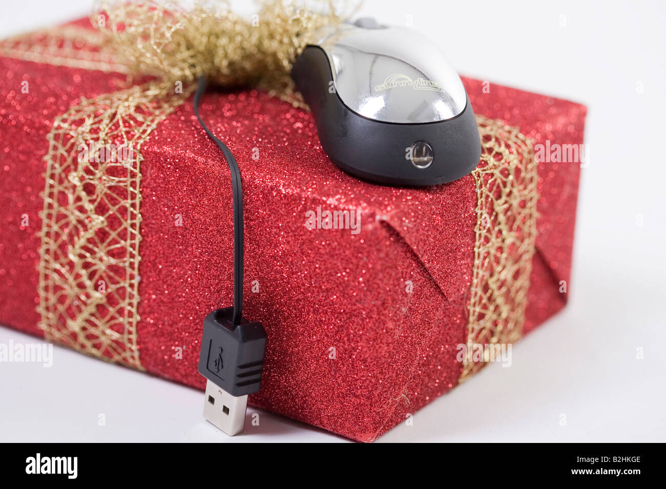 Ancora in vita del regalo di Natale e il mouse del computer Foto Stock