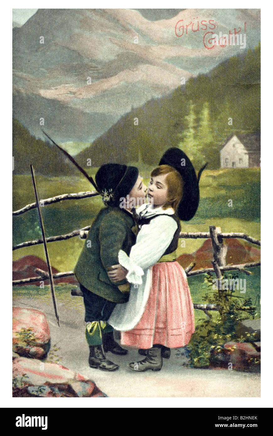 Cartolina motivo baciare amare i bambini in Baviera con grembiule del XX secolo la Germania Foto Stock