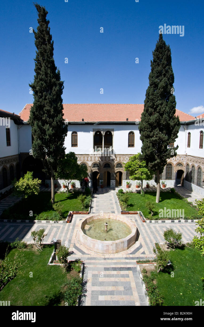 Cortile interno al Dar Anbar Palace una vecchia casa dentro la città vecchia a Damasco in Siria Foto Stock