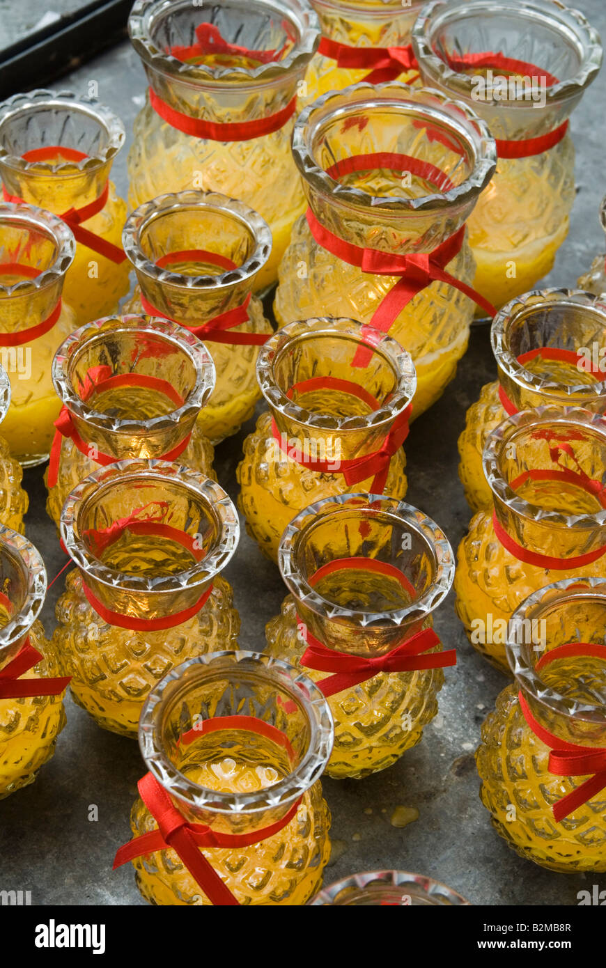 Candele in vasetti di vetro Foto Stock