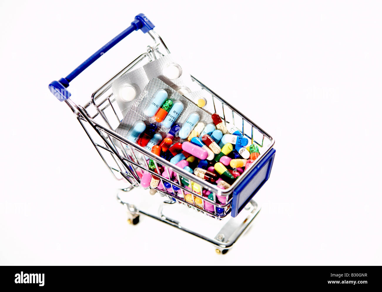 Carrello riempito con le pillole e vesciche di farmaco Foto Stock