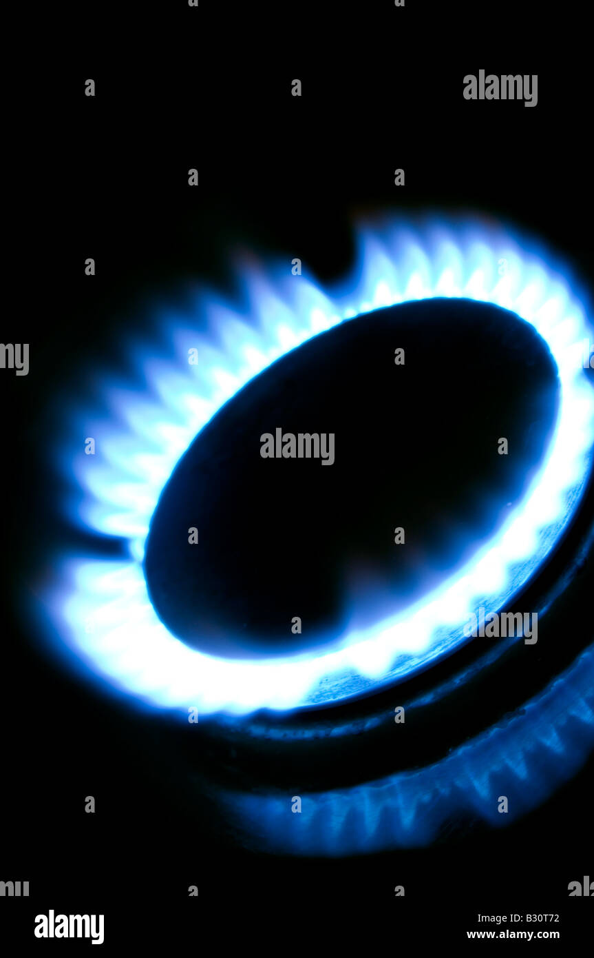 Gas di fuoco di fiamma riscaldamento termico bill rising cucinare pentola a cottura anello blu mare del Nord il GPL liquido petrolium naturale società rete uti Foto Stock