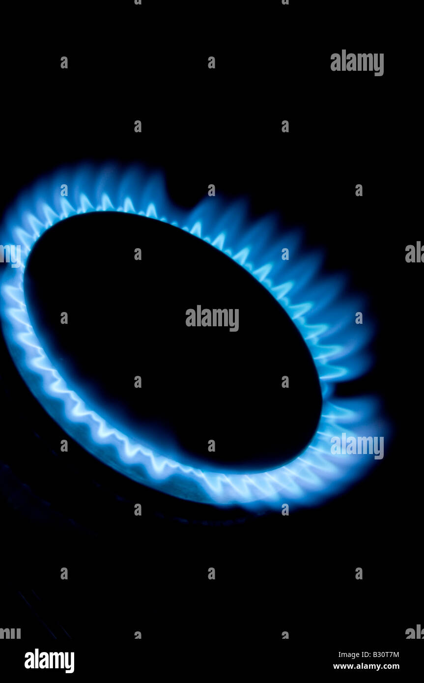 Gas di fuoco di fiamma riscaldamento termico bill rising cucinare pentola a cottura anello blu mare del Nord il GPL liquido petrolium naturale società rete uti Foto Stock