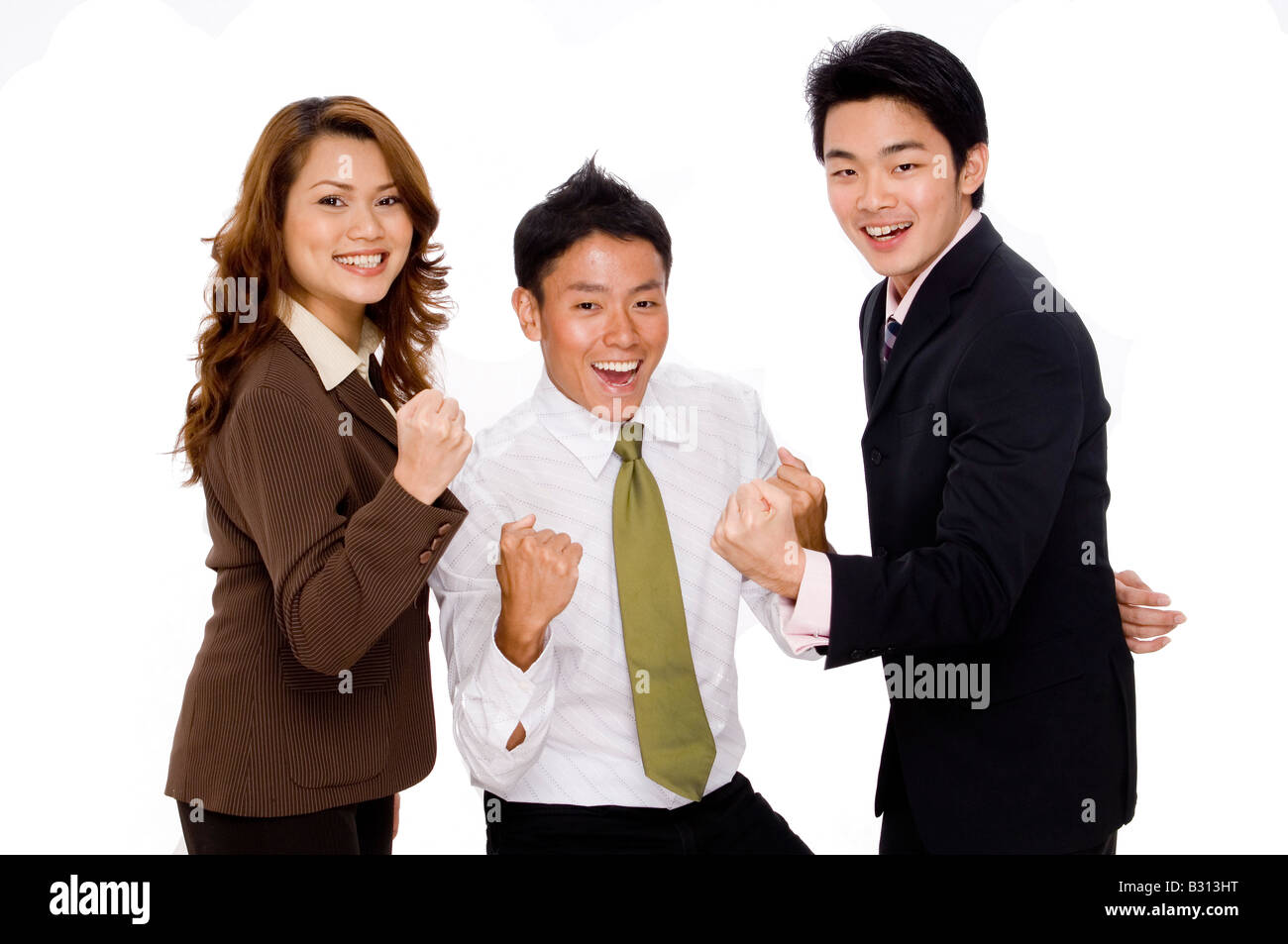 Un giovane asian business team festeggia Foto Stock