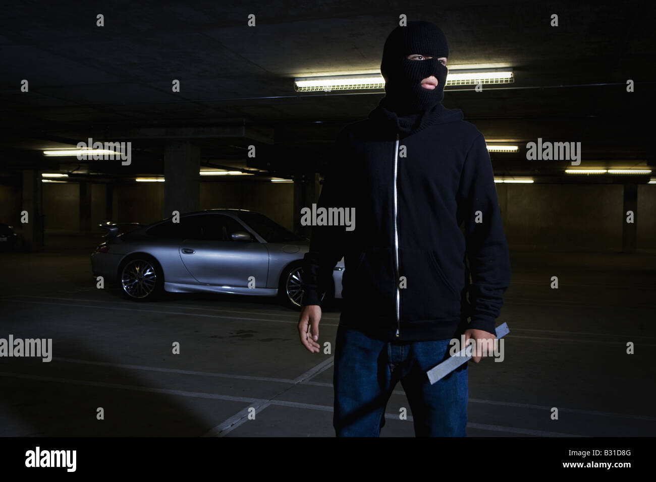 Ladro con palanchino da Porsche Carrera Foto Stock