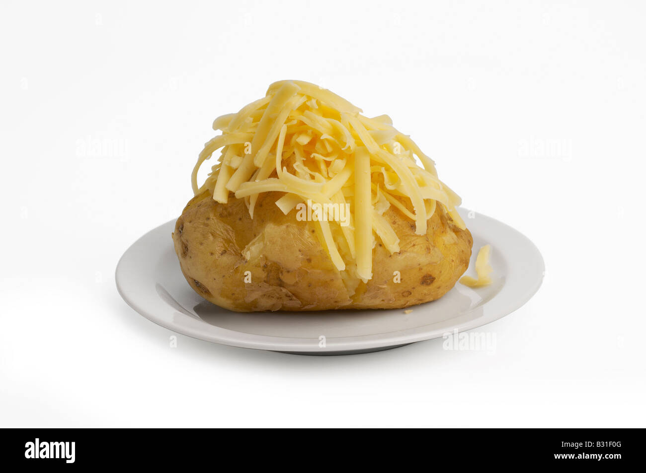 Patate al forno con formaggio cheddar Foto Stock