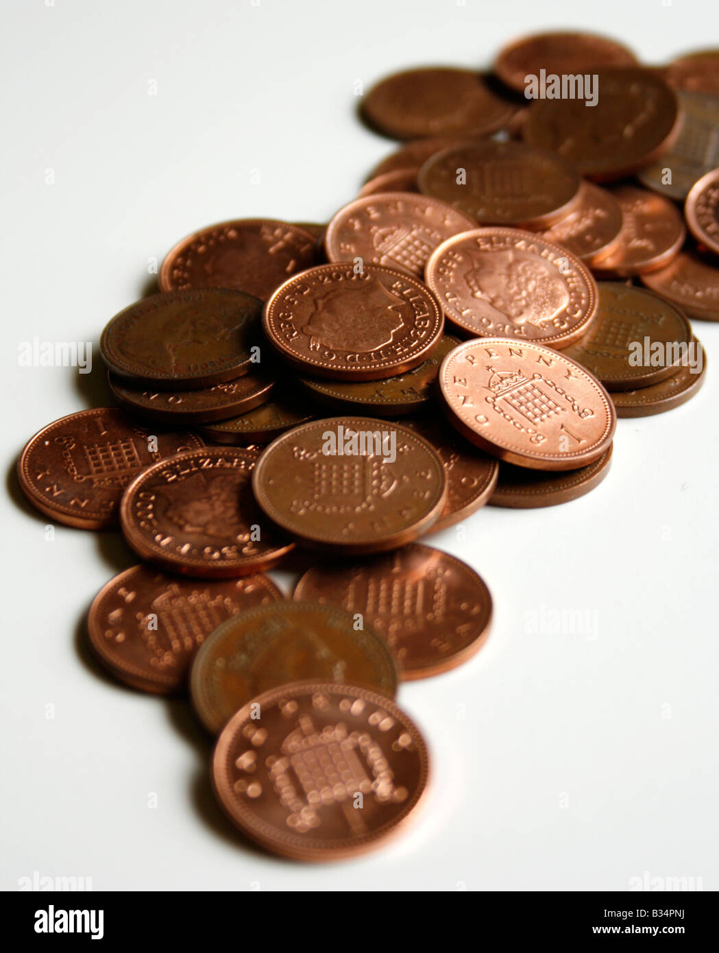 Il rame penny monete. (Sterling ) Foto Stock
