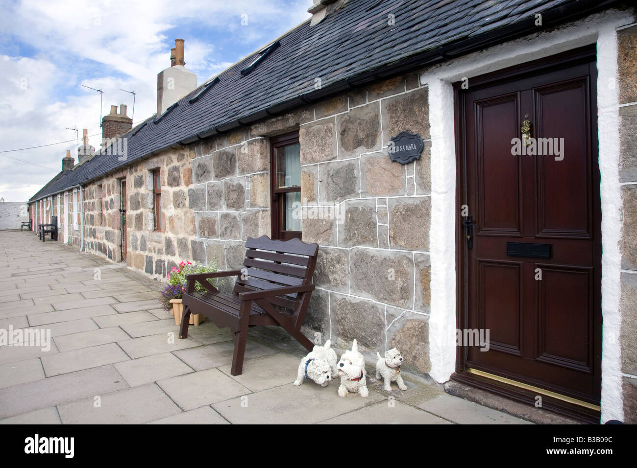 Case e giardini, capannoni in Footdee, St Fittick o Fittie, Aberdeen Scotland, Regno Unito. Fittie piazze, un modello di sistema di alloggiamento costruito per i pescatori in 1809. Foto Stock