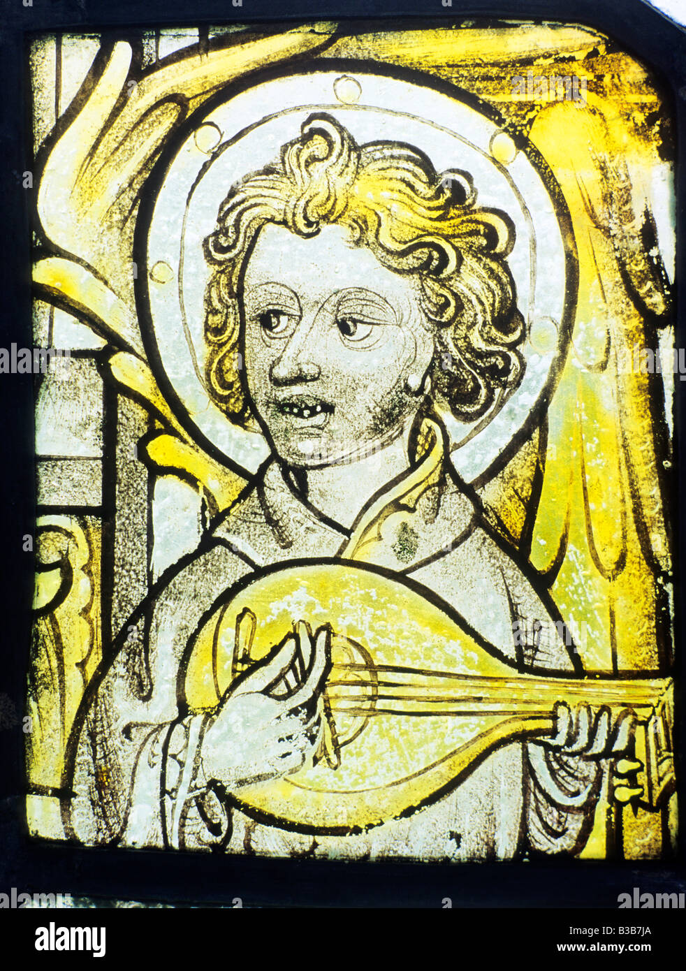 Medieval angelo alato musicista musica strumento musicale menestrello liuto cetra Warham chiesa East Anglia Norfolk England Regno Unito Foto Stock