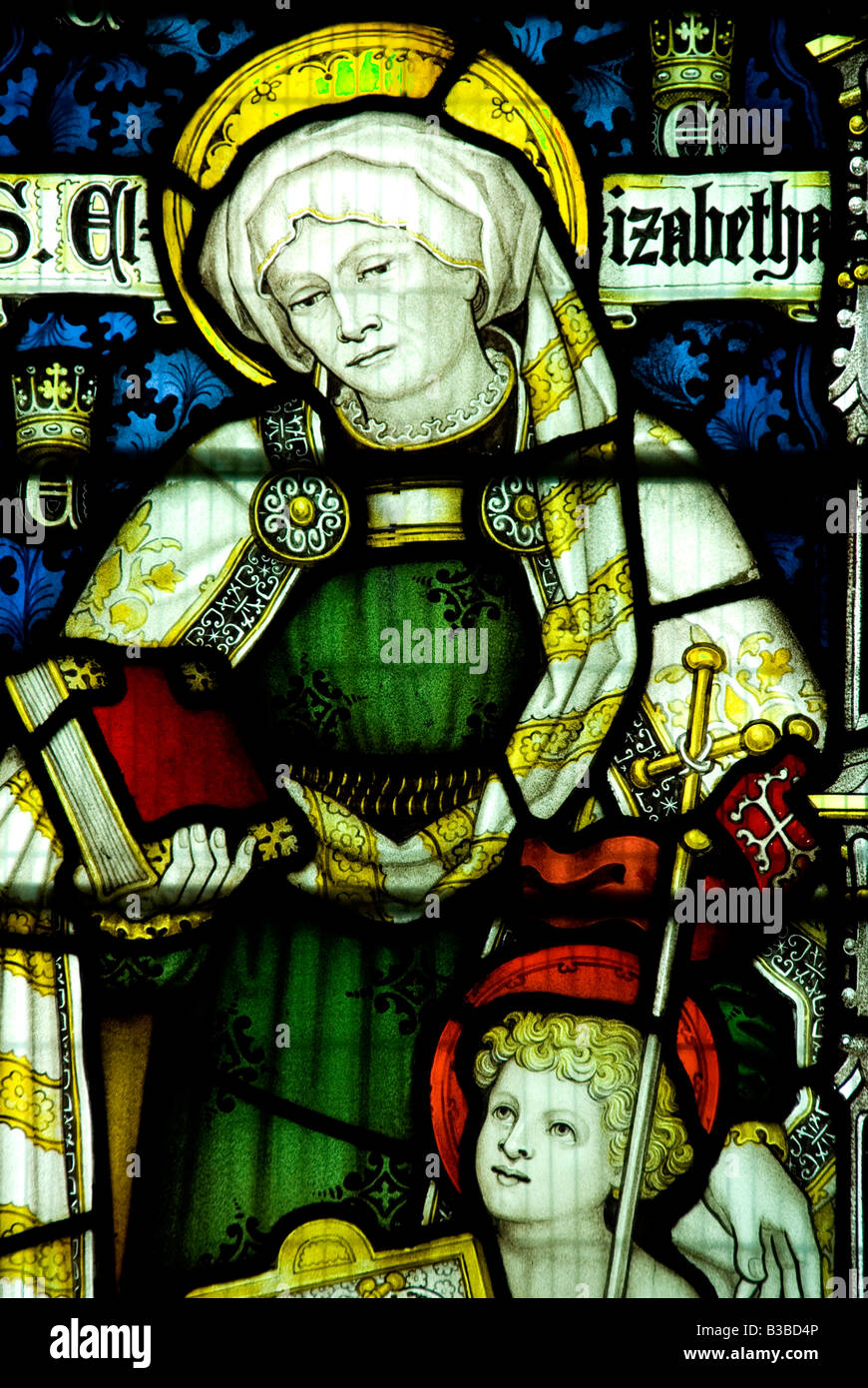 Santa Elisabetta e il bambino Gesù depiced in vetro colorato del XIII secolo San Giorgio chiesa Woolhope Herefordshire Foto Stock