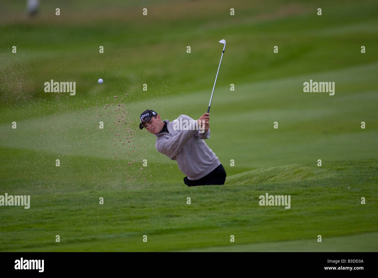 GLENEAGLES SCOZIA agosto 28 Germania s Martin Kaymer giocando un bunker shot mentre competere nel Johnnie Walker Classic Foto Stock