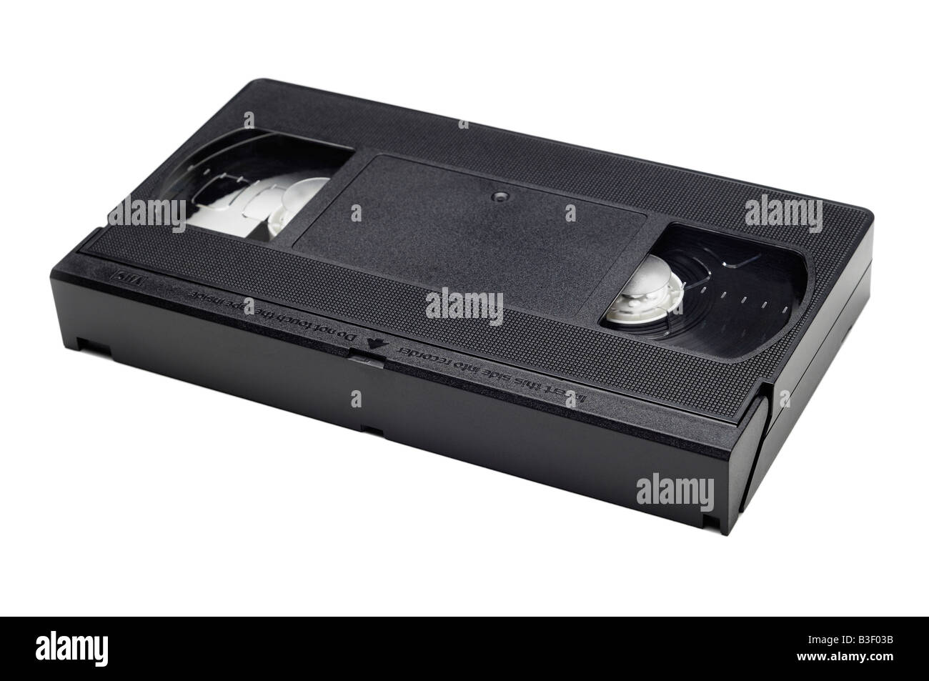 Il nastro per videocassette contro uno sfondo bianco Foto Stock