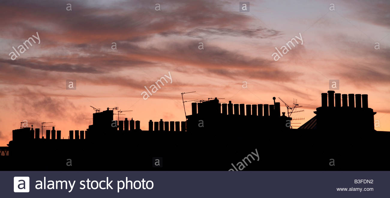 Stagliano chimneypots al crepuscolo Foto Stock