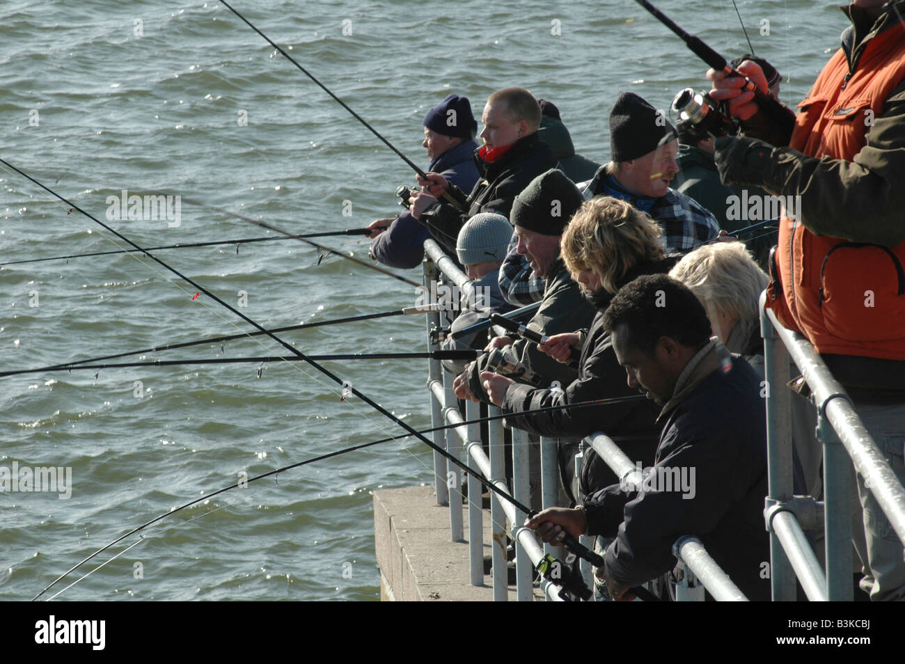 I pescatori pranzo come sardine la pesca di aringhe Foto Stock