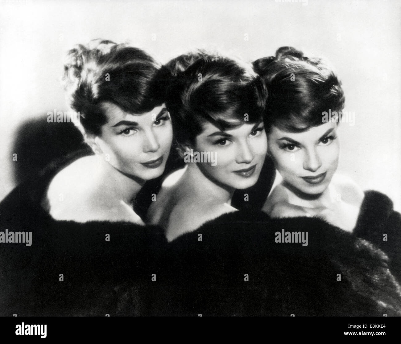La McGUIRE sorelle noi del gruppo vocale da sinistra Christine, Phyllis e Dorothy che ha avuto una stringa di colpire i record attraverso gli anni Cinquanta Foto Stock