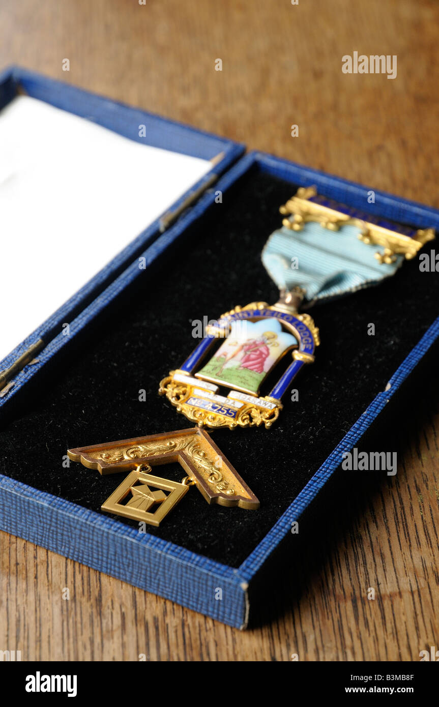 Una chiusura di un vecchio, d'Oro, Medaglia massonica in una scatola di presentazione, risalente agli anni trenta del novecento Foto Stock