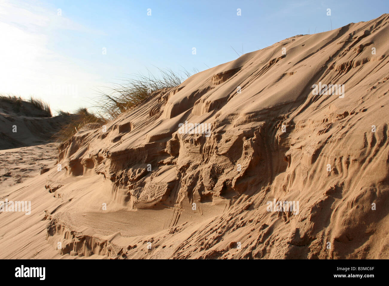 Dune di sabbia scolpite dal vento Foto Stock