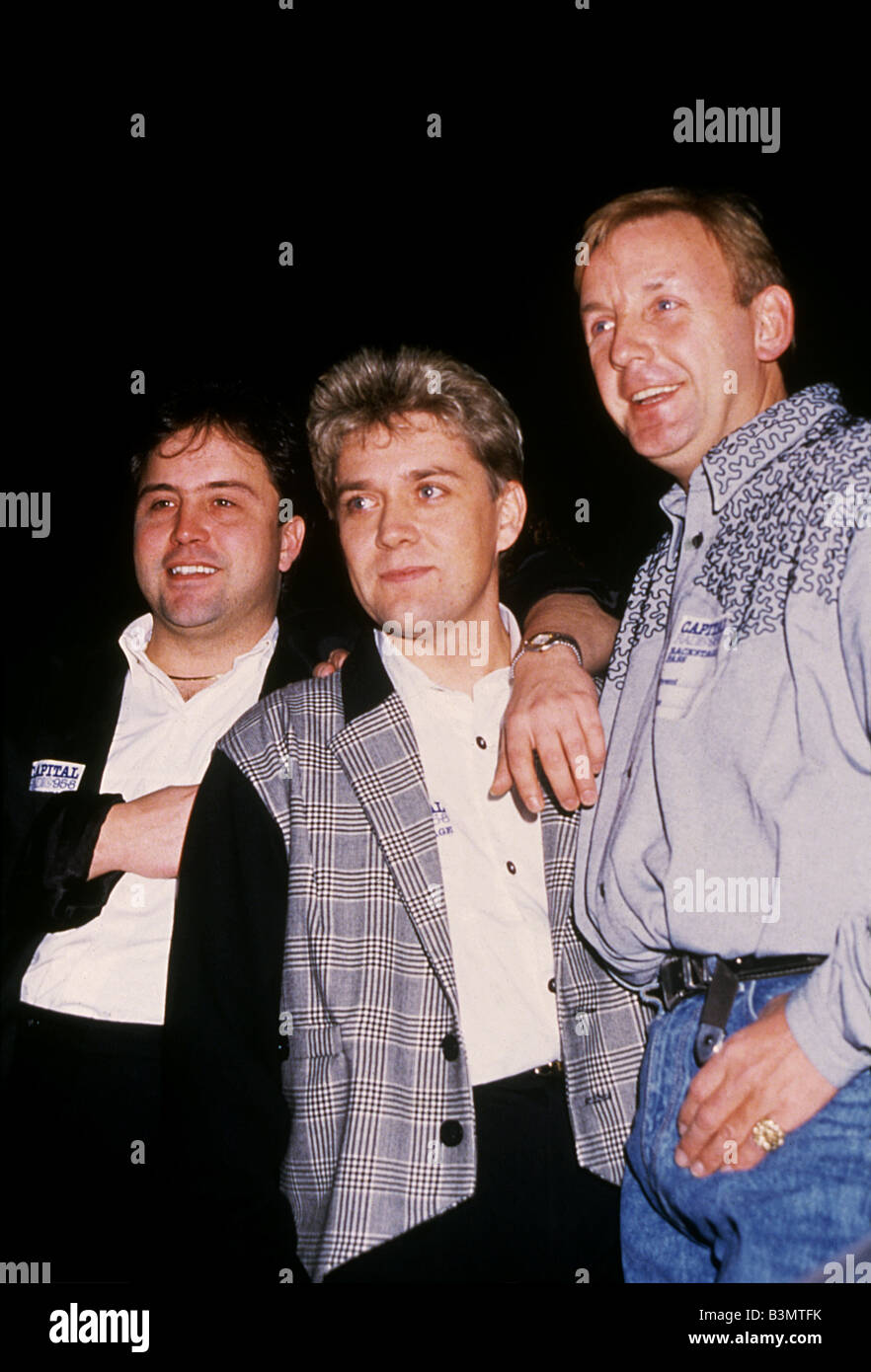 STOCK, AITKEN E WATERMAN UK pop produttori musicali. Da l: Mike Stock, Matteo Aitken e Pete Waterman circa 1989 Foto Stock