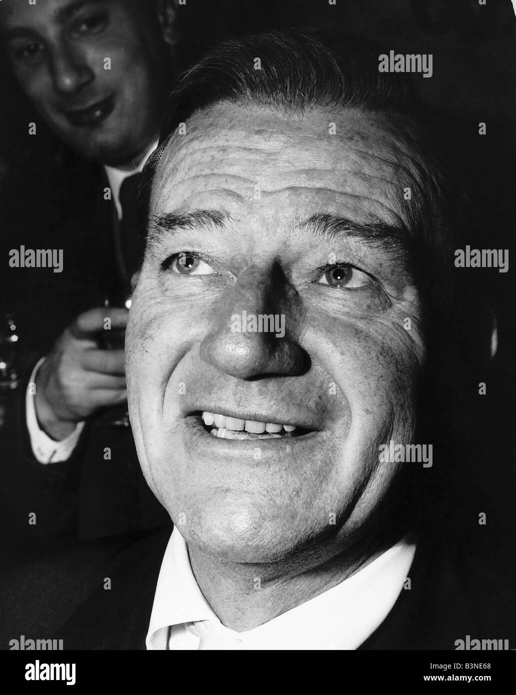 John Wayne in città per la premiere del suo film epico Alamo Foto Stock