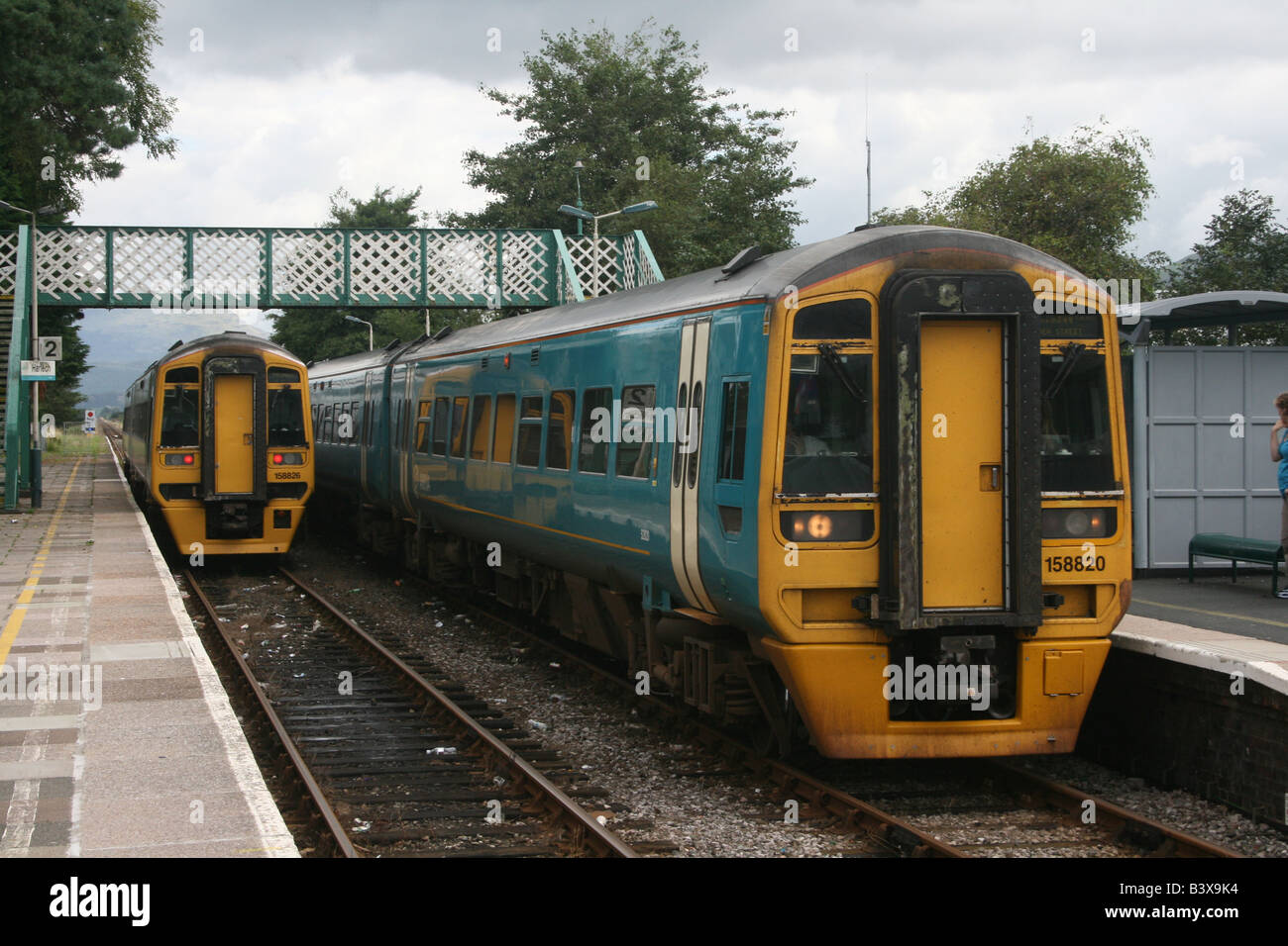 I treni a Harlech Stazione, Gwynedd, Galles. Foto Stock