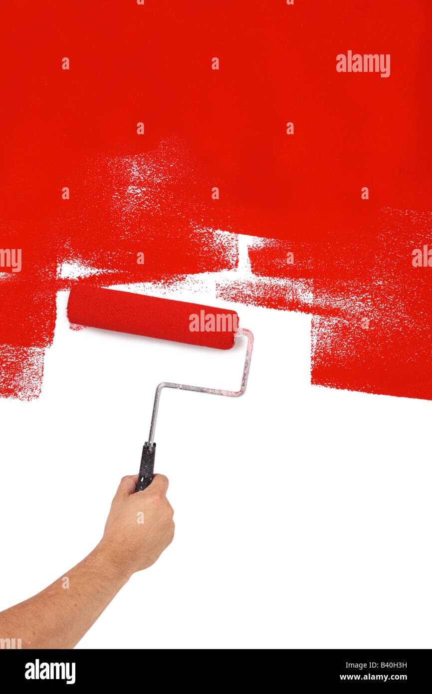 Dipinto di rosso con rullo di vernice tagliato fuori isolati su sfondo bianco Foto Stock