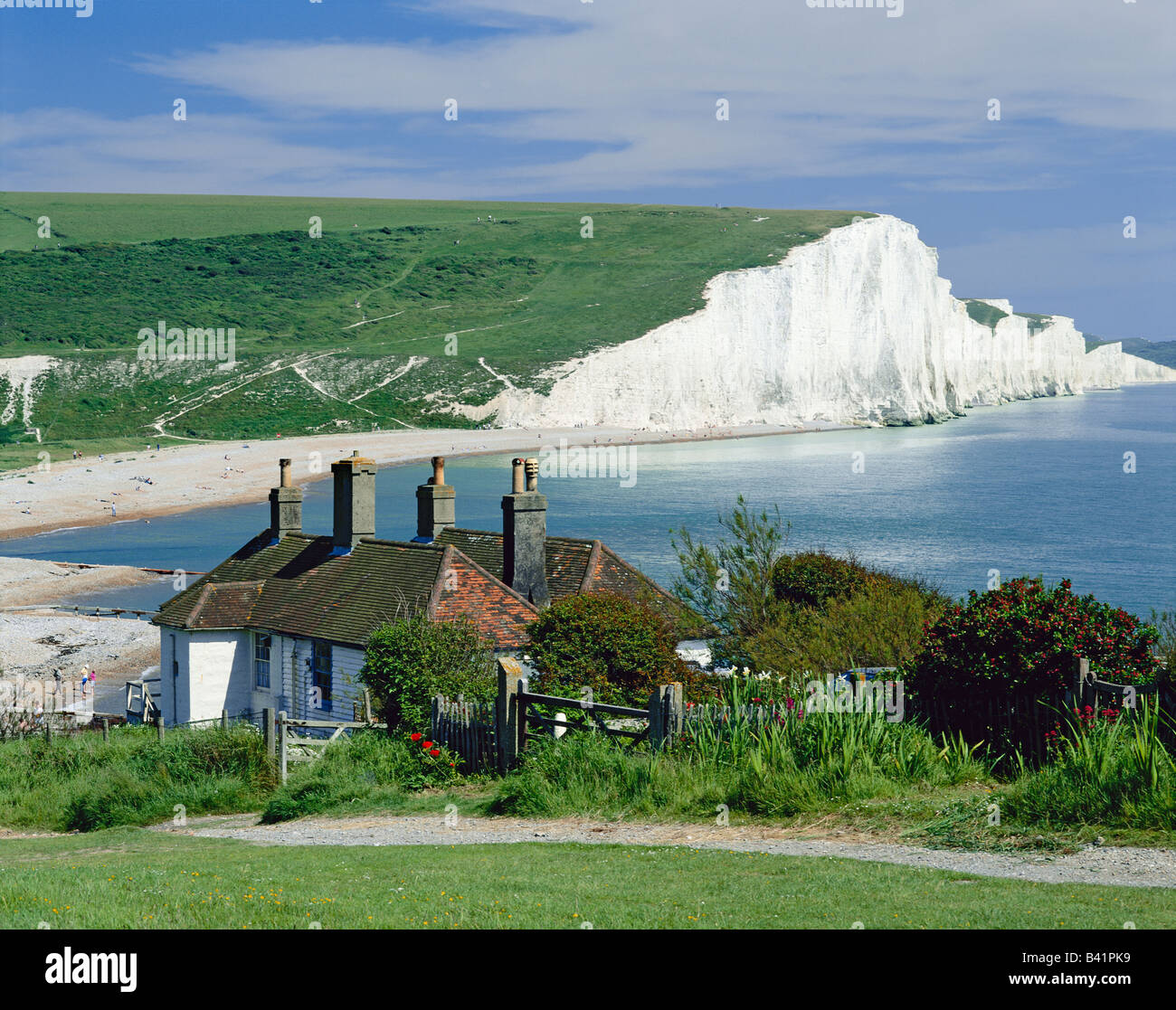 Seven Sisters, scogliere di gesso e case di guardia costiera, da Seaford Head, East Sussex, Gran Bretagna, Inghilterra, GB, Regno Unito, Sussex Downs Foto Stock