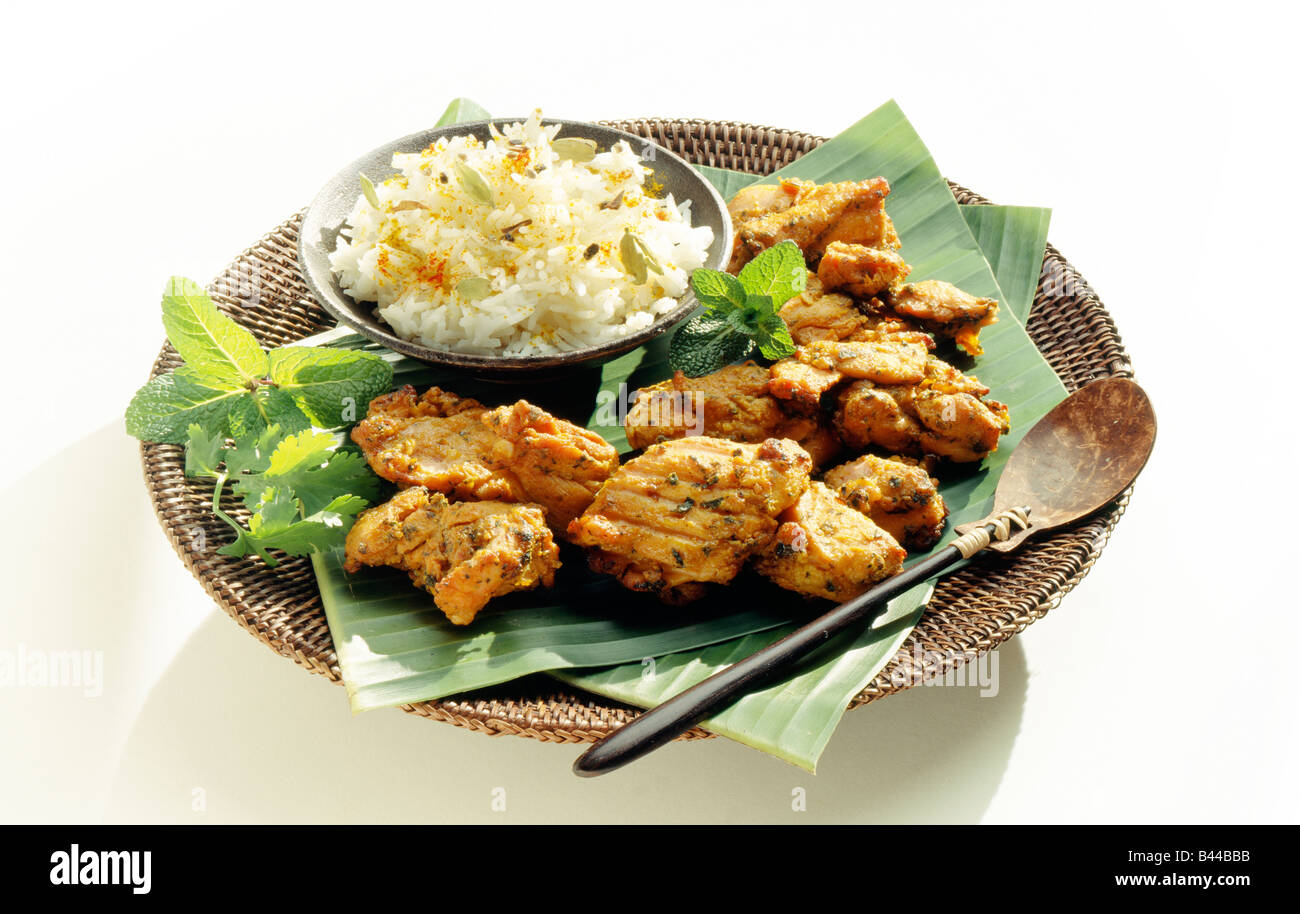 Pollo Tandoori e riso con coriandolo Foto Stock