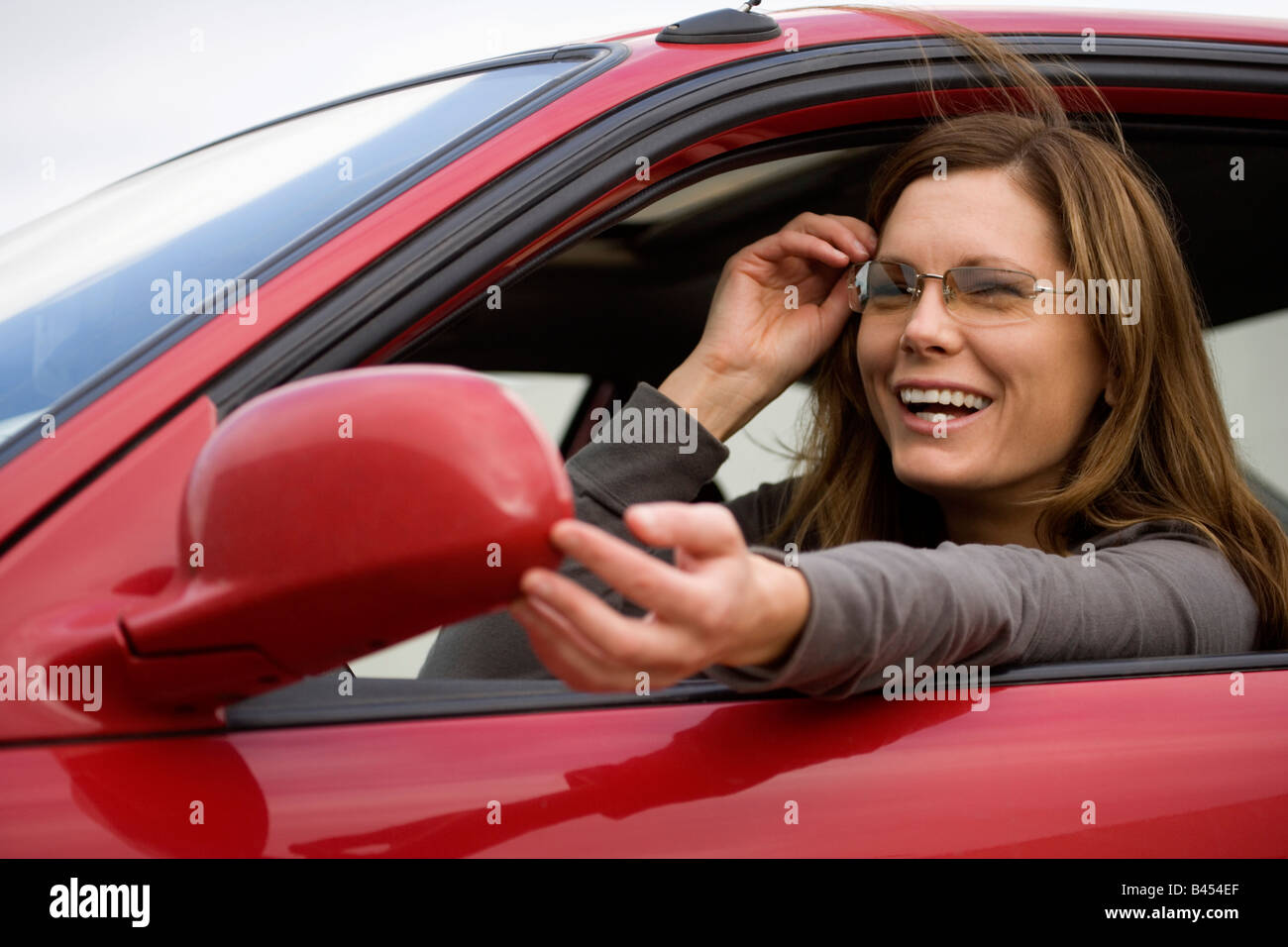 La donna nella sua auto Foto Stock