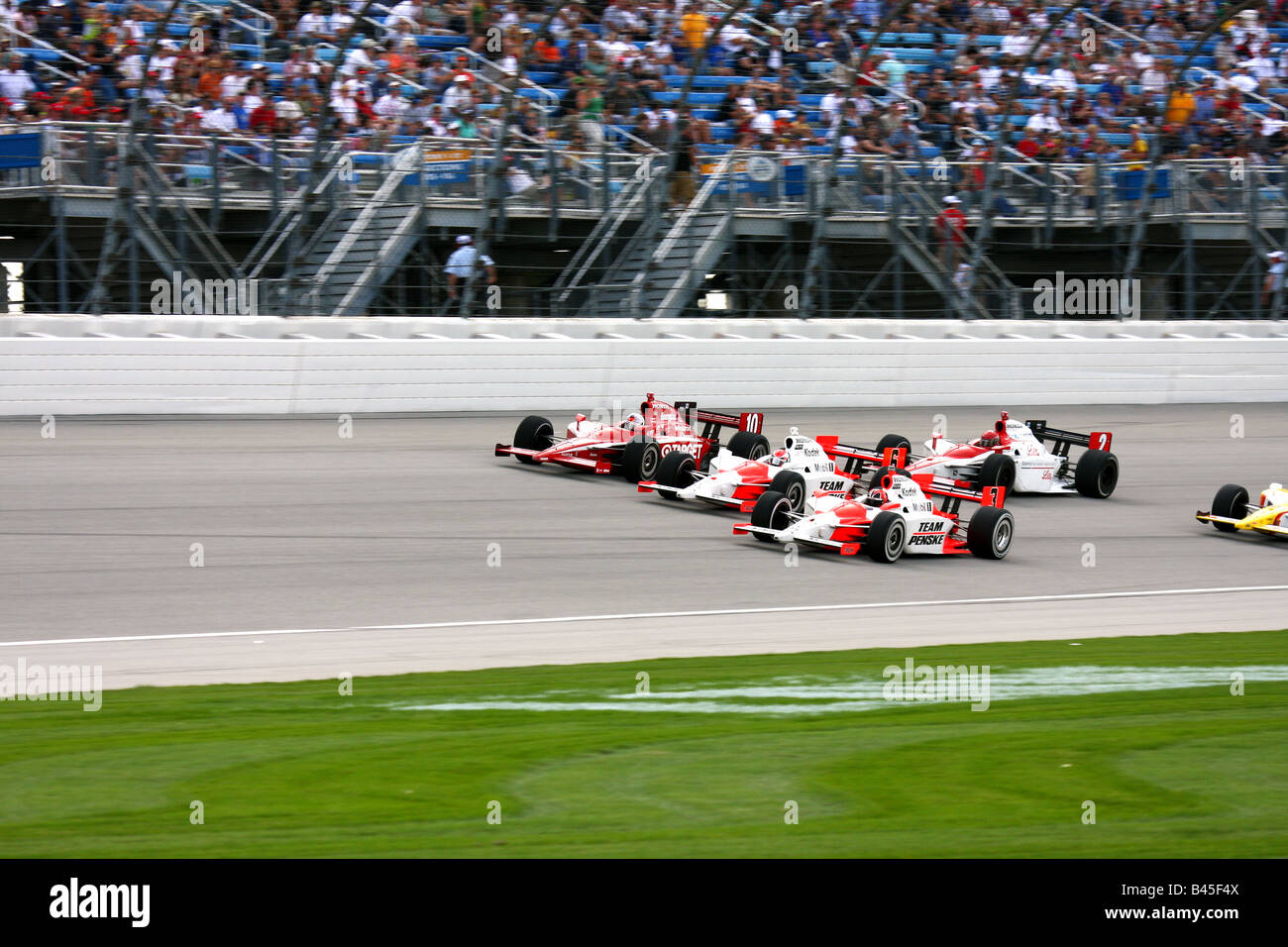 Wheldon Briscoe Castroneves tre ampi Foto Stock