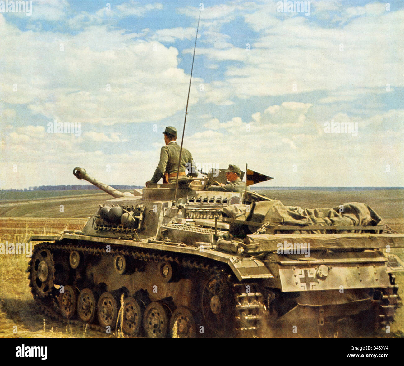 Wehrmacht Panzer Reconnoitres un comandante del serbatoio si guarda intorno sul Fronte Orientale in WW II inizio nella campagna di Russia Foto Stock