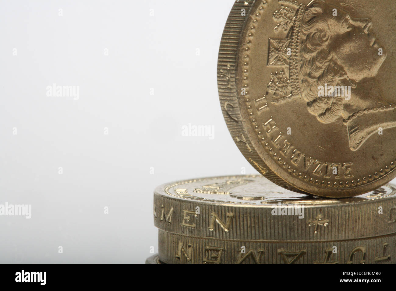 Sterlina inglese delle monete in euro Foto Stock