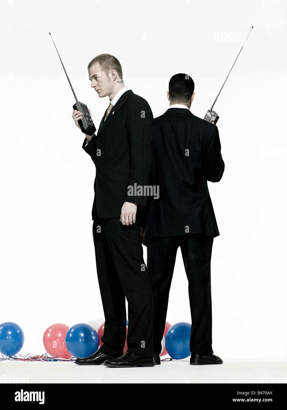 Gli uomini con il walkie-talkie Foto Stock