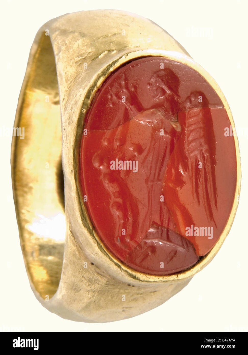 Un anello d'oro con un cameo, Hellenic 4th/3rd secolo a.C. Massiccio in oro  con un carnelio intagliato, che mostra la dea alata Nike che presenta un  giuramento di victor. La pietra presenta