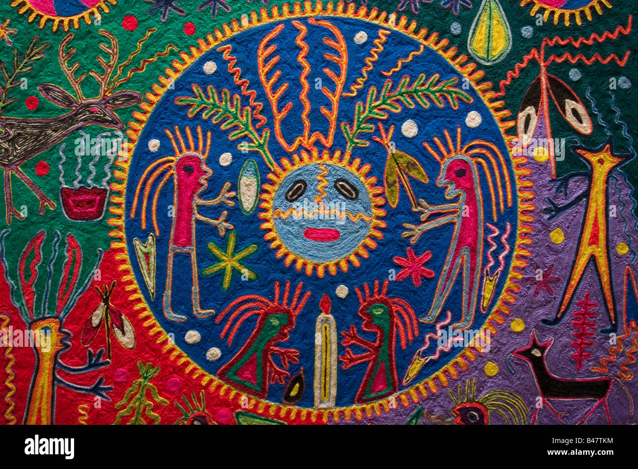 Filato Neirika pittura fatta dagli indiani Huichol del Messico centrale presso il Museo Nazionale di Antropologia di Città del Messico. Foto Stock