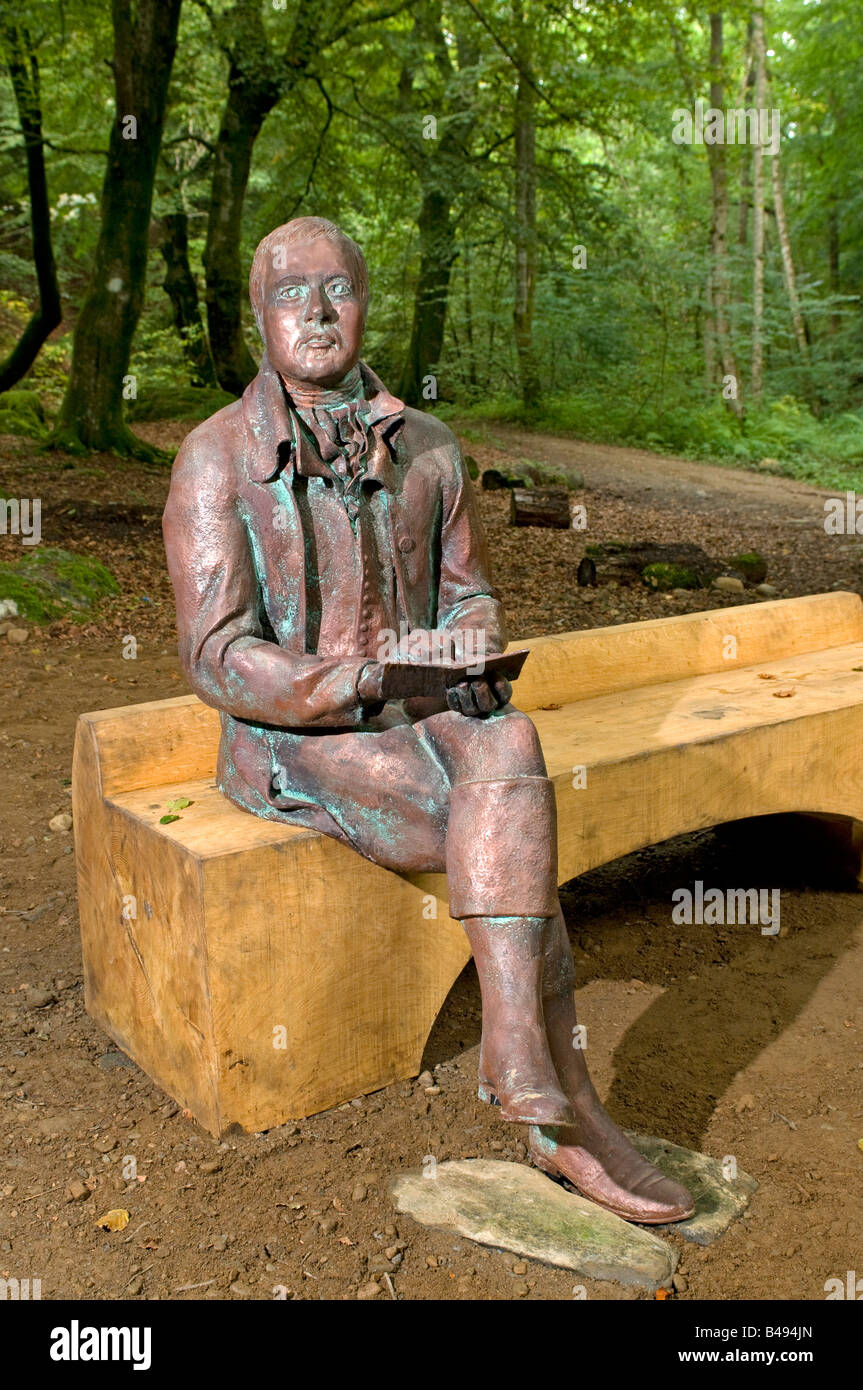 Seduto scultura in bronzo del poeta Scozzese Robert Burns in Birks di Aberfeldy Perthshire Foto Stock