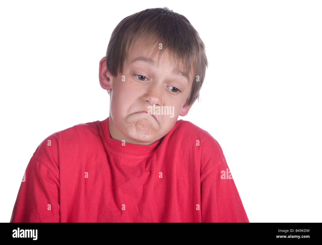 Questo ragazzo non è sicuro di qualcosa su bianco Foto Stock