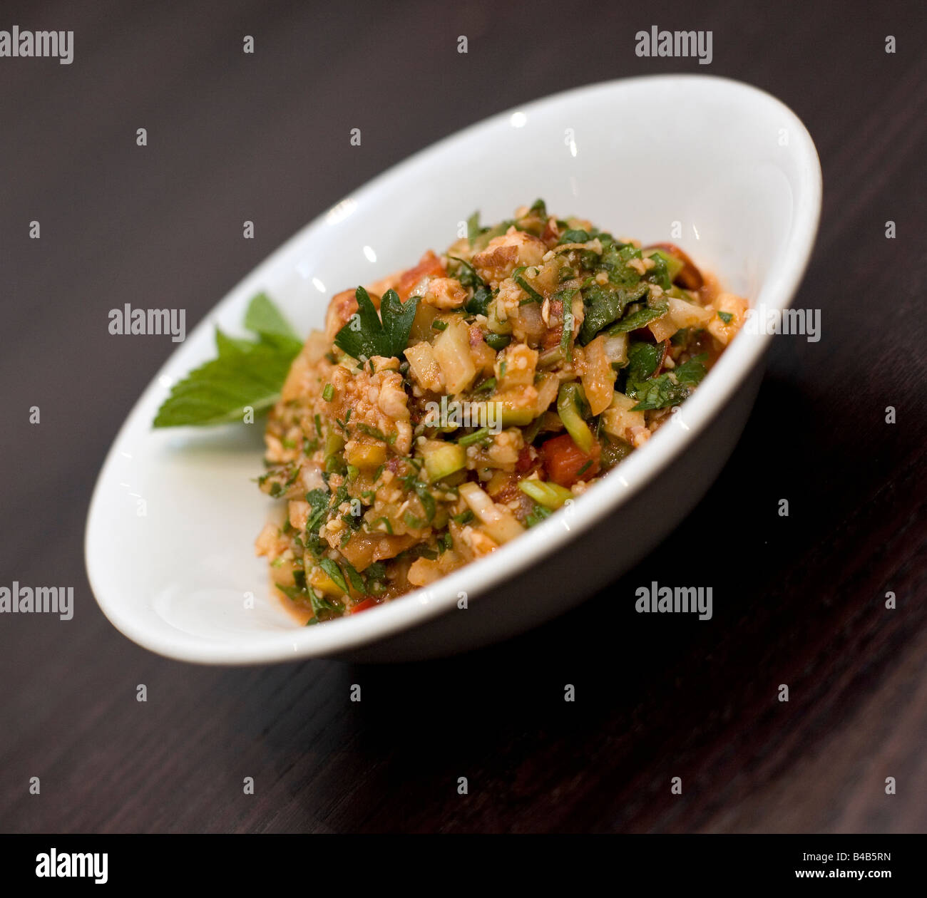 Insalata di prezzemolo con la menta e il pomodoro Foto Stock