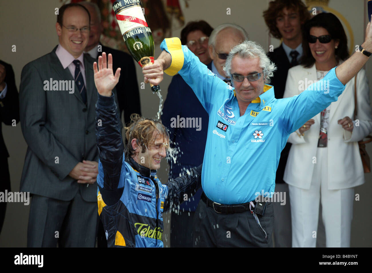 Lo sport del motore, Formel 1, Jarno Trulli e Flavio Briatore dopo la vittoria della Renault, personalità, Race Driver, vincitore, VIP, Porto Foto Stock