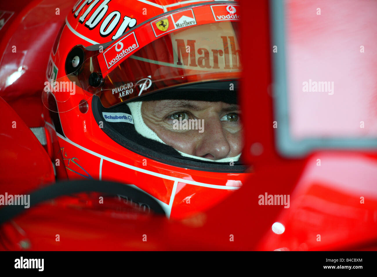 Lo sport del motore, Michael Schumacher in Ferrari, Formel 1 2005, Race Driver, ritratto con casco, Malaysia, fotografo: Daniel ri Foto Stock